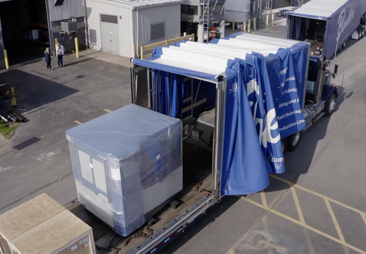 Unloading QED machine for local manufacturer